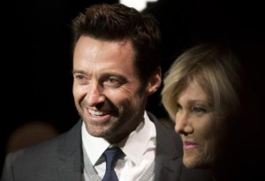 Actor Hugh Jackman (L) and wife Deborra-Lee Furness arrive for the Donna Karan New York show during New York Fashion Week February 10, 2014. Credit: Reuters/Carlo Allegri