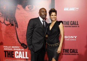 File photo of actress Halle Berry seen here posing with co-star Morris Chestnut at the premiere of "The Call" in Los Angeles, California March 5, 2013. REUTERS/Mario Anzuoni