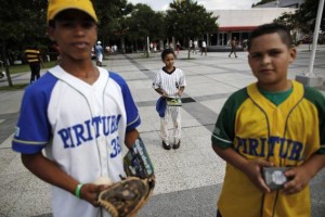Children from Pirituba club, a Brazilian baseball club, are pictured during a summer baseball festival for children at the Sesc Belenzinho club in Sao Paulo January 19, 2014. Credit: Reuters/Nacho Doce