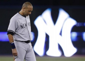 New York Yankees' Derek Jeter reacts after the end of the first inning against the Toronto Blue Jays during their MLB American League baseball game in Toronto in this file photo taken August 28, 2013. Credit: Reuters/Mark Blinch/Files