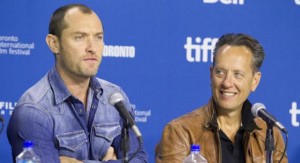 Actors Jude Law and actor Richard E. Grant attend a news conference for the film "Dom Hemingway" at the 38th Toronto International Film Festival
