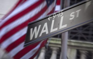  A Wall Street sign is pictured outside the New York Stock Exchange in New York, October 28, 2013. Credit: Reuters/Carlo Allegri 