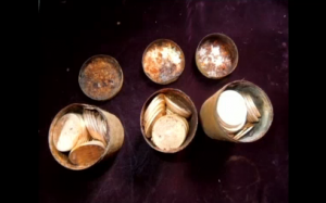These old tin cans containing rare Gold rush-era coins were found by a couple in California while walking their dog on their land. (Courtesy Reuters)