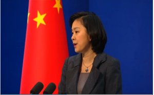 Chinese Foreign Ministry spokeswoman  Hua Chunying announcing Beijing's position that the Philippines is to blame for an incident in disputed waters in the South China Sea.  (Photo grabbed from Reuters video)