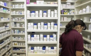  A pharmacy employee looks for medication as she works to fill a prescription while working at a pharmacy in New York December 23, 2009. Credit: Reuters/Lucas Jackson 