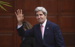U.S. Secretary of State Kerry waves upon arrival for a meeting with Palestinian President Abbas in Ramallah