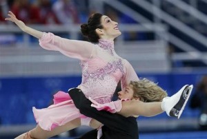 Meryl Davis (top) and Charlie White of the U.S. compete during the figure skating team ice dance short dance at the Sochi 2014 Winter Olympics, February 8, 2014. Courtesy REUTERS/Alexander Demianchuk