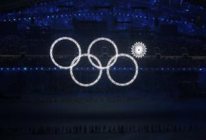 Four of the five Olympic Rings are seen lit up at the start of the opening ceremony of the 2014 Sochi Winter Olympics, February 7, 2014.  CREDIT: REUTERS/LUCY NICHOLSON 