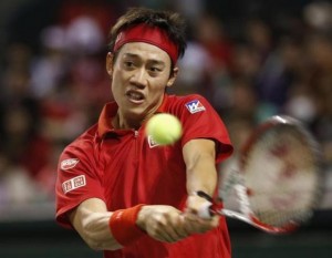 Japan's Kei Nishikori returns a shot against Canada's Frank Dancevic during their Davis Cup world group first round tennis match in Tokyo February 2, 2014. CREDIT: REUTERS/TORU HANAI