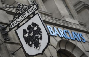 Logos are seen outside a branch of Barclays bank in London July 30, 2013. CREDIT: REUTERS/TOBY MELVILLE