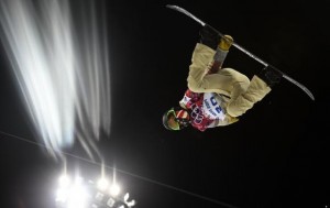  Shaun White of the U.S. performs a jump during a training session for the snowboard men's halfpipe competition at the 2014 Sochi Winter Olympic Games in Rosa Khutor February 10, 2014. Credit: Reuters/Dylan Martinez 