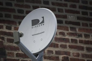  A Direct TV dish is seen outside a home in the Queens borough of New York July 29, 2013. Credit: Reuters/Shannon Stapleton 