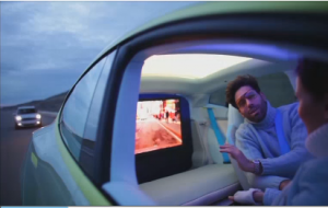 The Rinspeed XchangE is a luxury car that leaves the job of driving to an onboard computer while passengers relax and enjoy the ride. (Courtesy Reuters.  Photo grabbed from Reuters video)