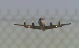 Royal New Zealand air force P3 Orion taking off from Perth Airport in Australia. It is one of 10 aircraft scheduled to take part in the search for the missing Malaysian Jet on Friday, March 28.  (Photo grabbed from Reuters video)