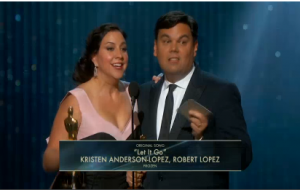Songwriters Kristen Anderson-Lopez and husband Fil-American Robert Lopez accept the Oscars for "Let It Go," soundtrack of the animated film "Frozen".  The song won the Oscars for "Best Original Song." Courtesy Reuters.  Photo grabbed from Reuters video