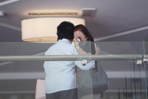 Family members of those onboard the missing Malaysia Airlines flight MH370 cry at a hotel in Putrajaya March 9, 2014. Malaysia Airlines said on Sunday it now feared the worst for its missing plane carrying 239 people, more than a day after it went missing, and was working with a U.S. company that specializes in disaster recovery.    REUTERS/Samsul Said 