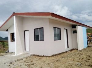 a model unit of the quadruplex housing being built by the Iglesia Ni Cristo for typhoon Yolanda survivors. The INC targets to build 250 quadruplex homes in six months' time.  (Photo courtesy DZEM)