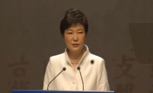 South Korean President Park Geun-hye urges Japan to acknowledge the past and proposes to North Koea for regular family reunions during an official ceremony marking the 95th anniversary of Independence Movement Day. (Photo grabbed from Reuters video)