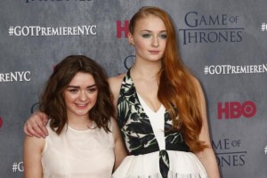 Cast members Maisie Williams and Sophie Turner arrive for the season four premiere of the HBO series "Game of Thrones" in New York