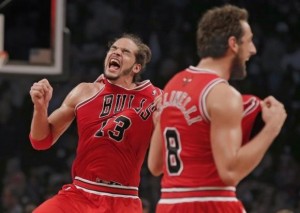 Chicago Bulls center Noah and Chicago Bulls guard Belinelli celebrate after they beat Brooklyn Nets to advance to next round in Game 7 of their NBA Eastern Conference Quarterfinals basketball playoff series in New York