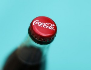 A bottle of Coca-Cola is shown in this photo illustration in Encinitas, California October 10, 2013. Credit: Reuters/Mike Blake