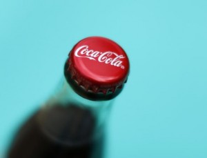 A bottle of Coca-Cola is shown in this photo illustration in Encinitas, California October 10, 2013. Credit: Reuters/Mike Blake