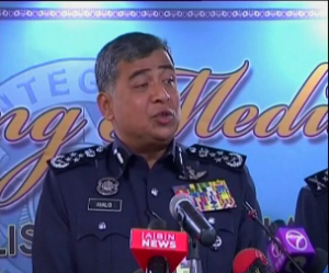 Inspector General of Police, Royal Malaysian Police Force, Khalid Abu Bakar said the passengers have been cleared of possible involvement in activity that could have been connected to the flight's disappearance on March 8. (Courtesy Reuters.  Photo grabbed from Reuters video)