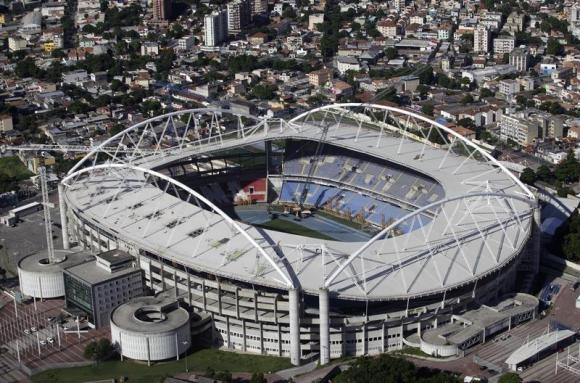 An aerial shot shows the Olympic Stadium, which is closed for repair works on its roof, in Rio de Janeiro March 28, 2014. CREDIT: REUTERS/RICARDO MORAES