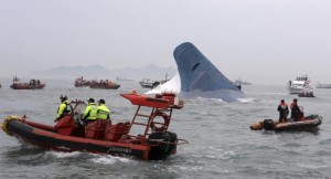 Part of South Korean passenger ship ''Sewol'' that has been sinking is seen as South Korean maritime policemen search for passengers in the sea off Jindo April 16, 2014. CREDIT: REUTERS/HYUNG MIN-WOO/YONHAP