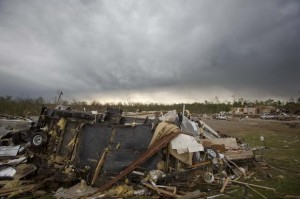Cars and debris are pictured at Mayflower RV in Mayflower, Arkansas April 29, 2014. CREDIT: REUTERS/CARLO ALLEGRI