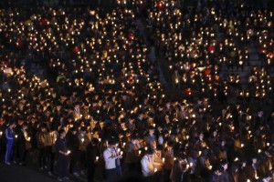 Students from Danwon high school and other people attend a candlelight vigil to wish for the safe return of missing passengers from the South Korean ferry ''Sewol'', which sank in the sea off Jindo, at a park in Ansan April 19, 2014. Credit: Reuters/Park Jung-ho/News1