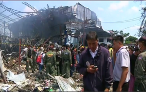 Seven were left dead, while 19 were injured after a suspected World War II bomb which was being cut open by scrap metal workers exploded in Bangkok on Wednesday, April 2.  (Photo grabbed from Reuters video)