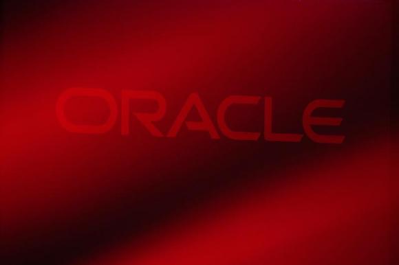 An Oracle Corporation logo is seen on stage prior to the announcement of the company's latest SPARC servers at Oracle Conference Center in Redwood Shores, California March 26, 2013. CREDIT: REUTERS/STEPHEN LAM