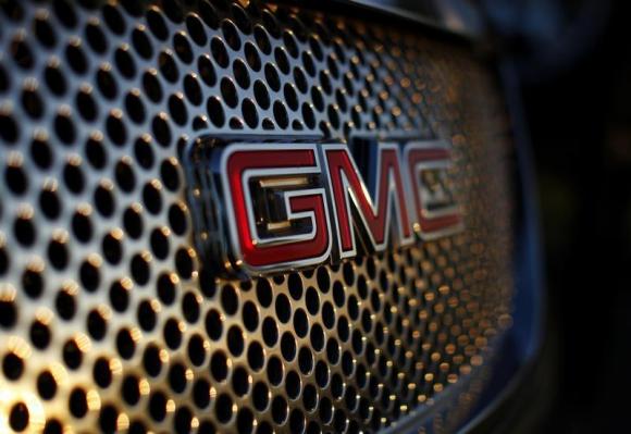 A General Motors logo is seen on a Denali vehicle for sale at the GM dealership in Carlsbad, California January 4, 2012. CREDIT: REUTERS/MIKE BLAKE
