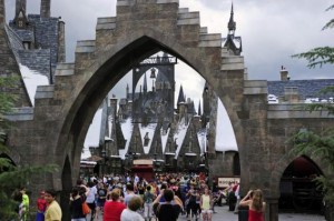 Guests walk in and out of Hogsmeade Village during a media preview for The Wizarding World of Harry Potter-Diagon Alley at the Universal Orlando Resort in Orlando