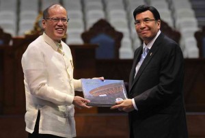 President Benigno S. Aquino III receives the first copy of the Philippine Arena Coffee Table Book presented by Iglesia ni Cristo (INC) Executive Minister Brother Eduardo Manalo during the Inauguration of Ciudad de Victoria (City of Victory) in Bocaue, Bulacan on Monday (July 21). Ciudad de Victoria is a 50-hectare tourism enterprise zone established by the INC in time for its centennial celebration on Sunday (July 27). (Photo by: Gil Nartea / Ryan Lim / Malacañang Photo Bureau)