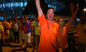 The Netherlands fans celebrate their World Cup third-place win over Brazil in Brasilia's national stadium, as Brazil fans react to a rare second consecutive defeat on home soil (Photo grabbed from Reuters video/ Credit Reuters)