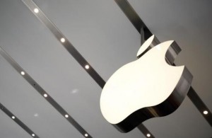  The Apple logo is pictured inside the newly opened Omotesando Apple store at a shopping district in Tokyo June 26, 2014. Credit: Reuters/Yuya Shino 