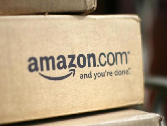 A box from Amazon.com is pictured on the porch of a house in Golden, Colorado July 23, 2008. Credit: Reuters/Rick Wilking