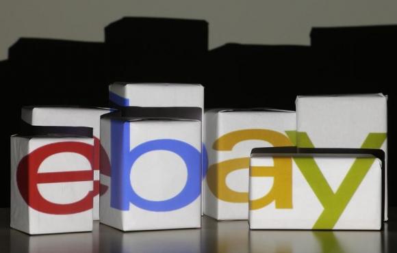 An eBay logo is projected onto white boxes in this illustration picture taken in Warsaw