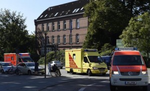 An employee of the WHO, who contracted Ebola in Sierra Leone, arrives at the 'Universitaetsklinikum Hamburg-Eppendorf ' in an ambulance, in Hamburg