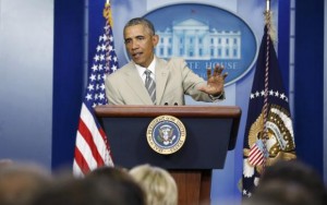 U.S. President Barack Obama addresses reporters in the White House Press Briefing Room ahead of a meeting with his national security council in Washington, August 28, 2014. REUTERS/Larry Downing