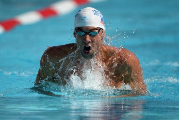 Michael Phelps swims 1:58.74 in a 200m individual medley heat to advance to the final in the 2014 USA National Championships at William Woollett Jr. Aquatics Complex.Aug 10, 2014; Irvine, CA, USA; Kirby Lee-USA TODAY Sports