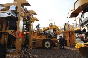 People look at OXBO harvesters at the 47th Annual World Ag Expo in Tulare, California in this February 12, 2014 file photo. Credit: Reuters/David Mcnew/Files