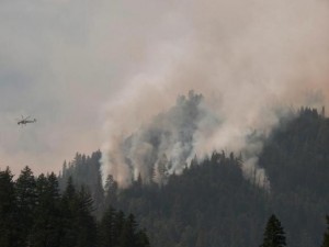 Fire suppression activities are seen at the Happy Camp complex fire in the Klamath National Forest, California September 14, 2014. REUTERS/Inciweb/Handout via Reuters