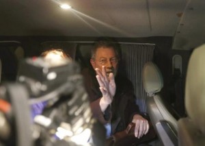 UN special envoy Robert Serry gestures as he leaves in a car in Simferopol