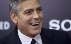 Cast member George Clooney arrives for the premiere of his movie ''The Monuments Men'' in New York February 4, 2014. Credit: Reuters/Carlo Allegri
