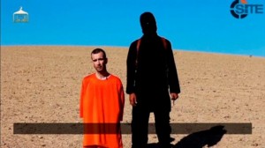 A still image taken from a purported Islamic State video released September 13, 2014 of British captive David Haines before he is beheaded. REUTERS/SITE Intel Group via Reuters TV
