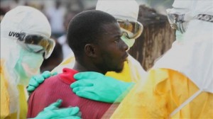 Health workers surround an Ebola patient who escaped from quarantine from Monrovia's Elwa hospital, in the centre of Paynesville in this still image taken from a September 1, 2014 video. Credit: Reuters/Reuters TV