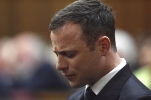 Olympic and Paralympic track star Oscar Pistorius reacts during judgement at the North Gauteng High Court in Pretoria, September 11, 2014. REUTERS/Phill Magakoe/Pool
